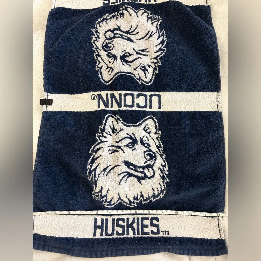 From team effort, UConn Husky towel, navy and white